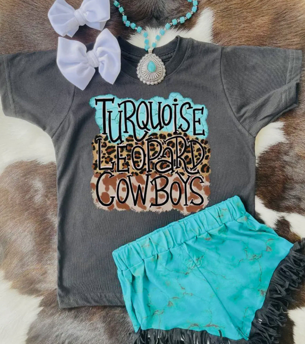Turquoise Leopard Cowboys tshirt
